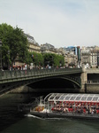 SX18577 Canal boat passing bridge over water and Centre Georges Pompidou, Paris, France.jpg